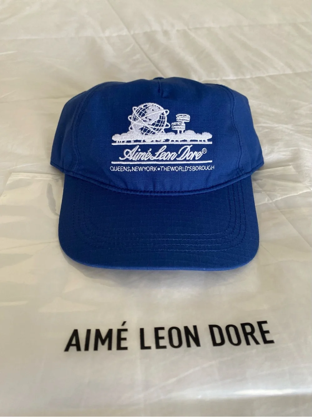 Aime Leon Dore Unisphere Hat In Royal Blue.